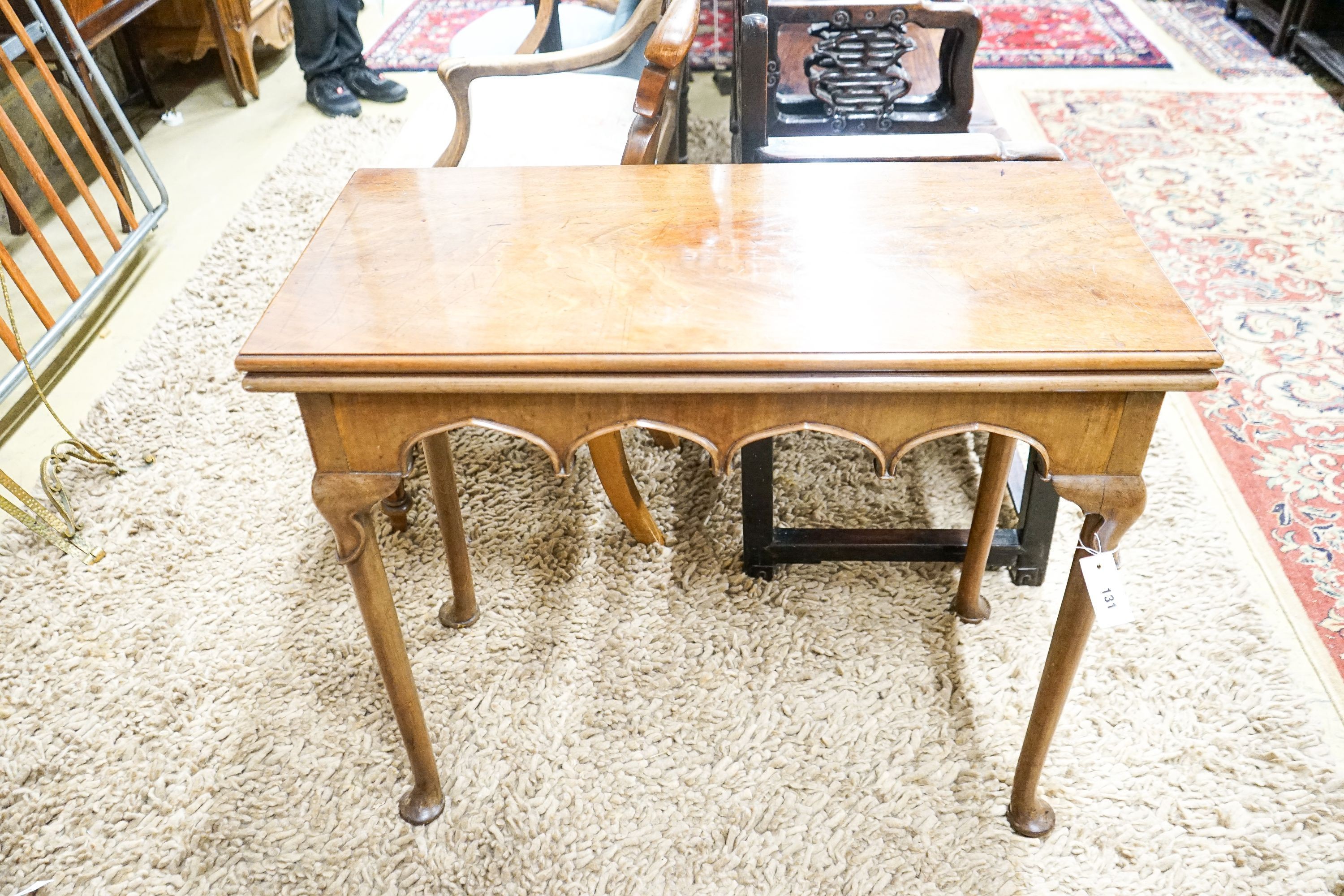 A George II rectangular mahogany folding tea table, width 86cm, depth 40cm, height 73cm